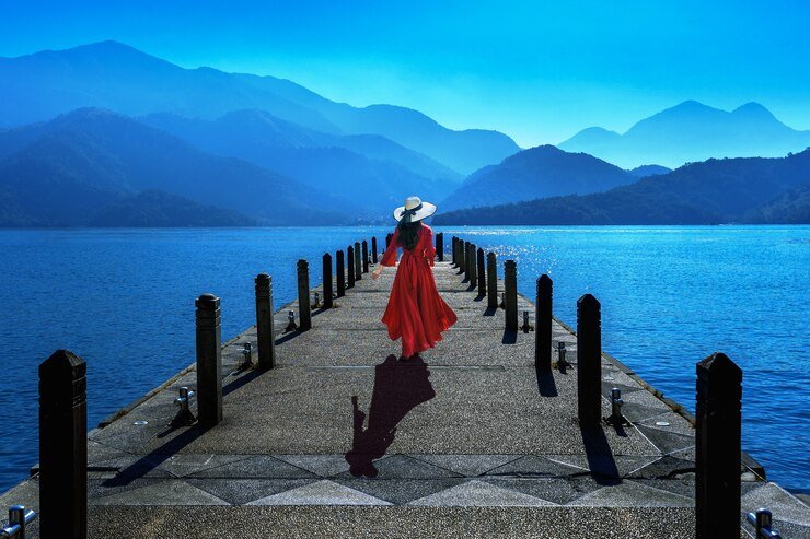 beautiful-girl-walking-sun-moon-lake-taiwan_335224-654